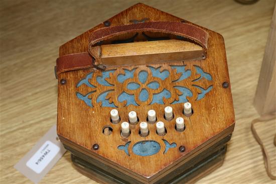 A 21-button Concertina Superior, possibly German, with fret-cut ends (faults, no case)